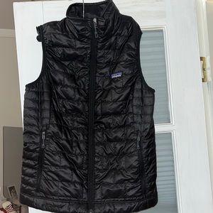 Black never worn Patagonia vest. Woman's size small